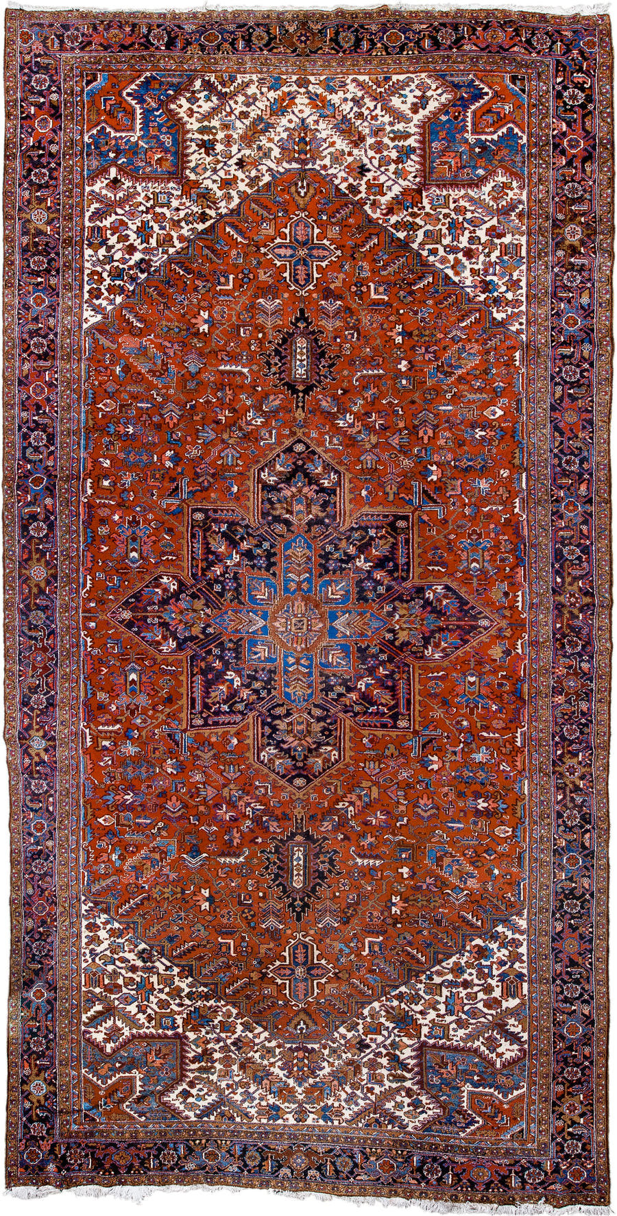 11' x 21' one-of-a-kind handmade antique Heriz oversize rug. Color palette: rust, ivory, navy, cobalt, terra cotta, charcoal