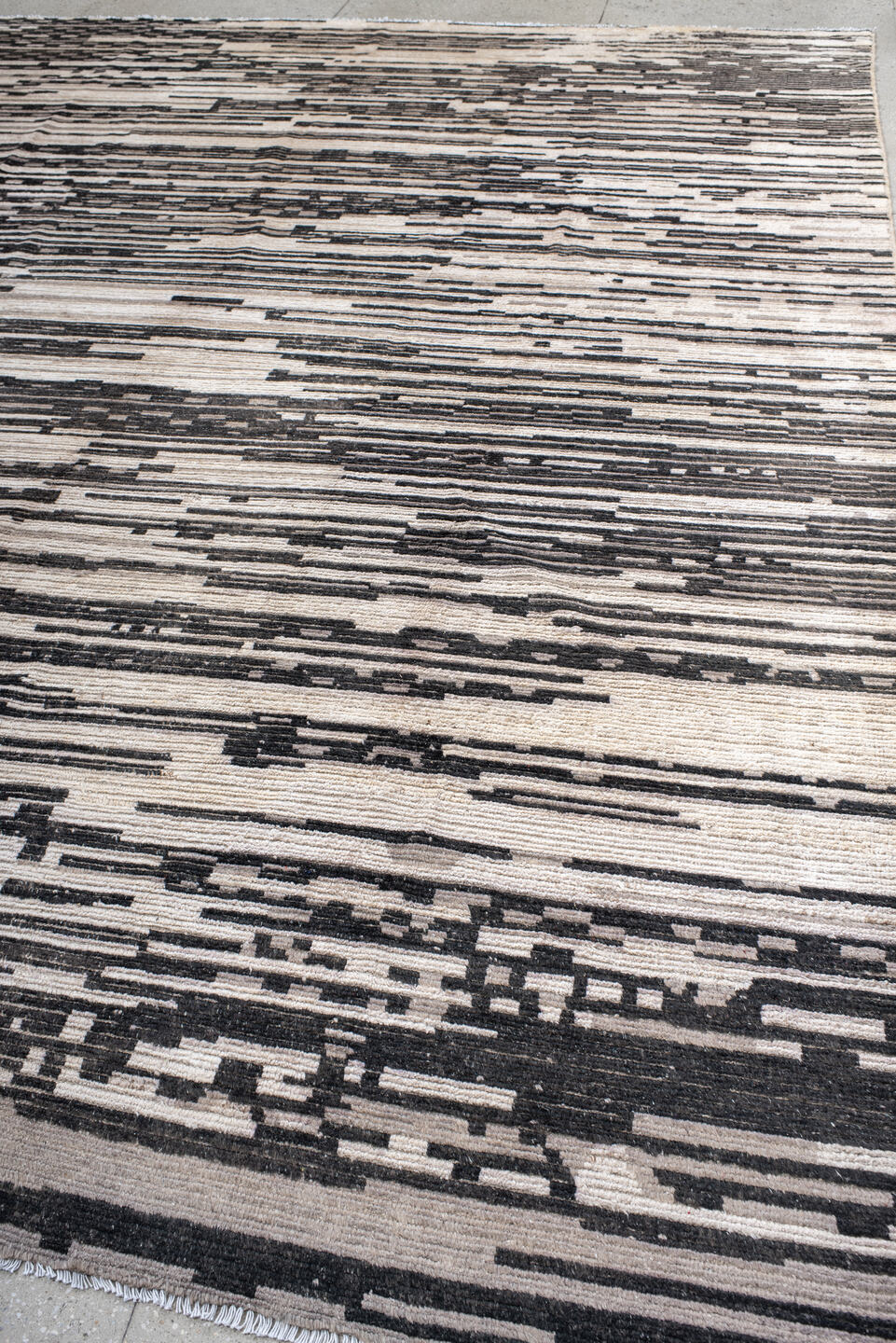 10' x 13' one-of-a-kind handmade vintage Tulu large size rug. Color palette: ivory, charcoal, gray, black, taupe, beige