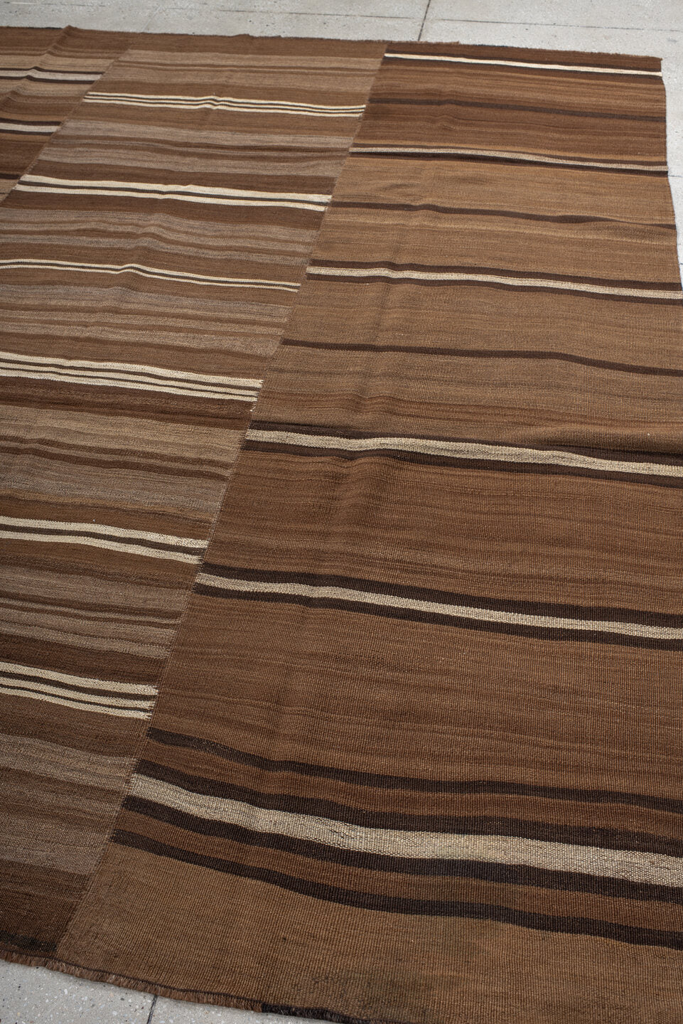 8' x 9' one-of-a-kind handmade vintage Kilim rug. Color palette: brown, taupe, camel, ivory, espresso, beige, gray, black