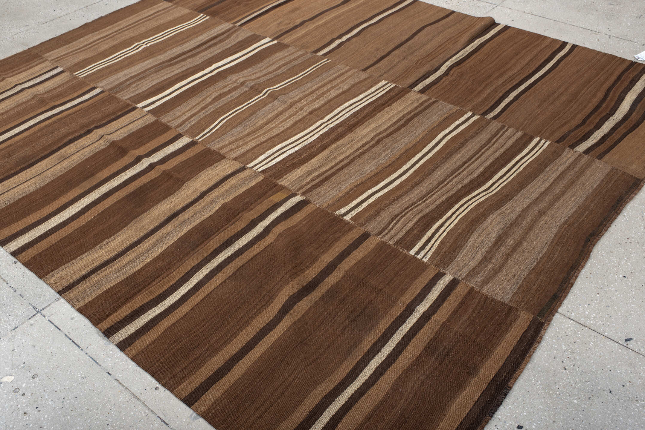 8' x 9' one-of-a-kind handmade vintage Kilim rug. Color palette: brown, taupe, camel, ivory, espresso, beige, gray, black