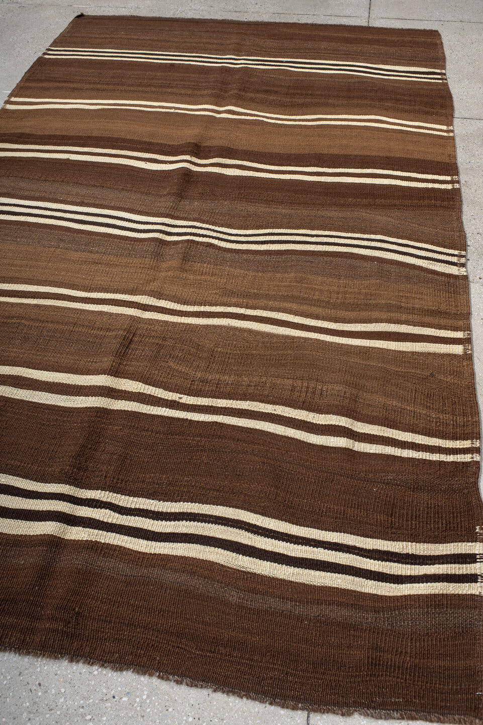 5' x 9' one-of-a-kind handmade vintage Kilim medium size rug. Color palette: brown, taupe, ivory, charcoal, camel, beige