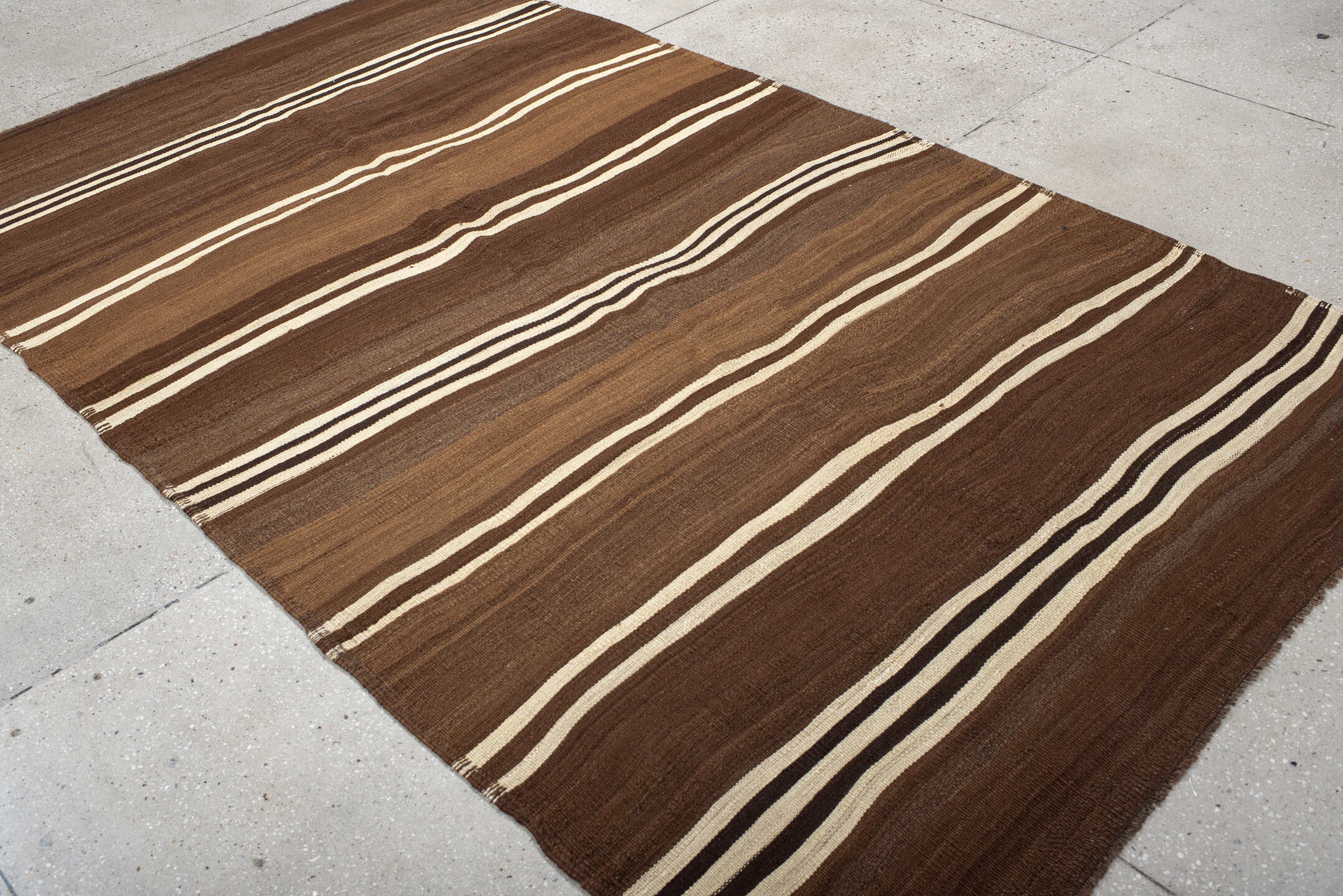 5' x 9' one-of-a-kind handmade vintage Kilim medium size rug. Color palette: brown, taupe, ivory, charcoal, camel, beige