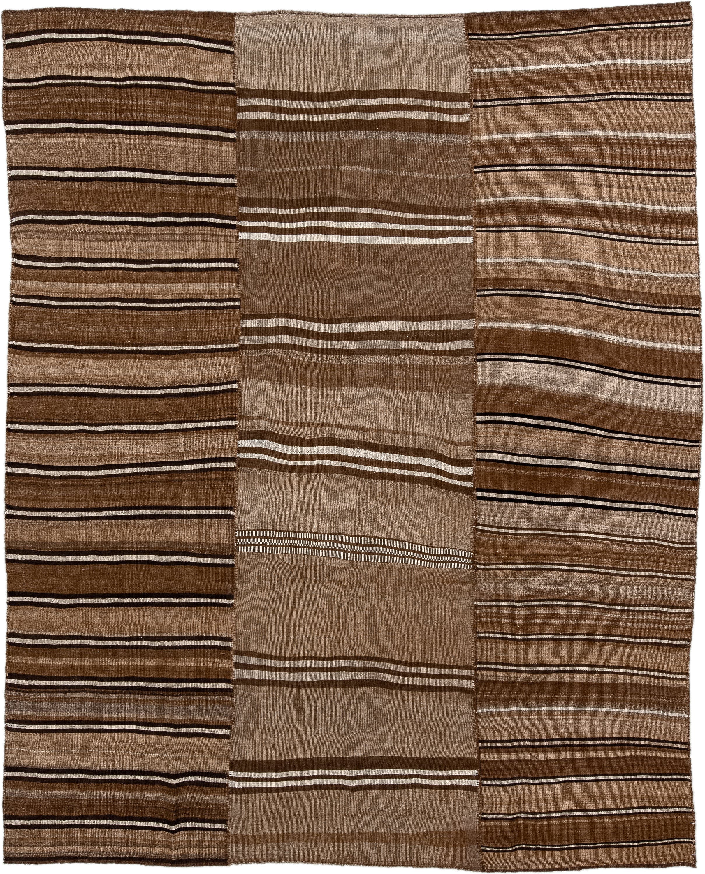 8' x 10' one-of-a-kind handmade vintage Kilim large size rug. Color palette: brown, taupe, camel, ivory, charcoal, beige
