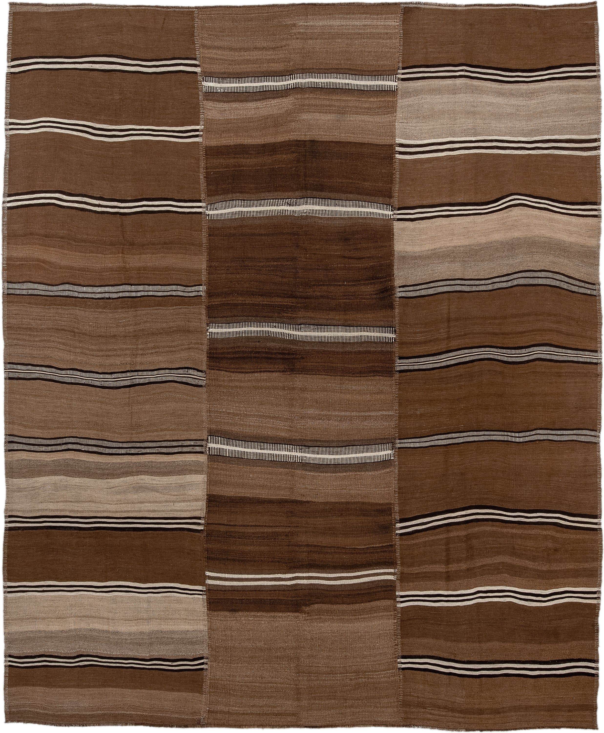 9' x 11' one-of-a-kind handmade vintage Kilim large size rug. Color palette: brown, taupe, camel, ivory, charcoal, beige