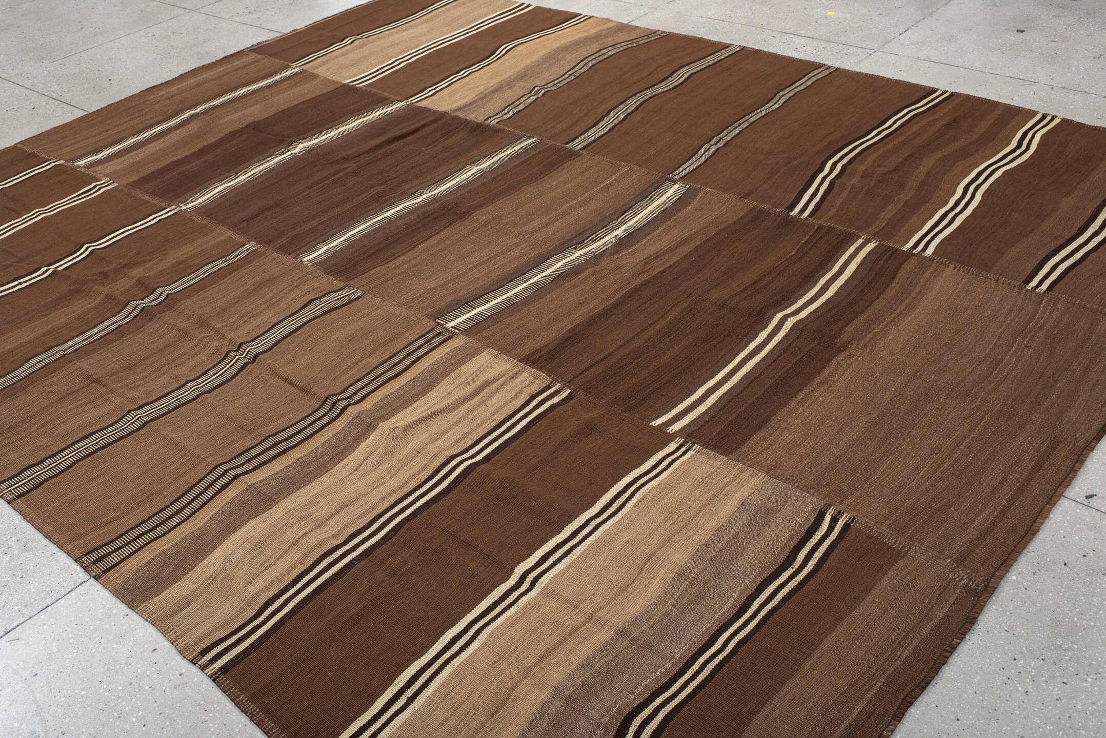 9' x 11' one-of-a-kind handmade vintage Kilim large size rug. Color palette: brown, taupe, camel, ivory, charcoal, beige