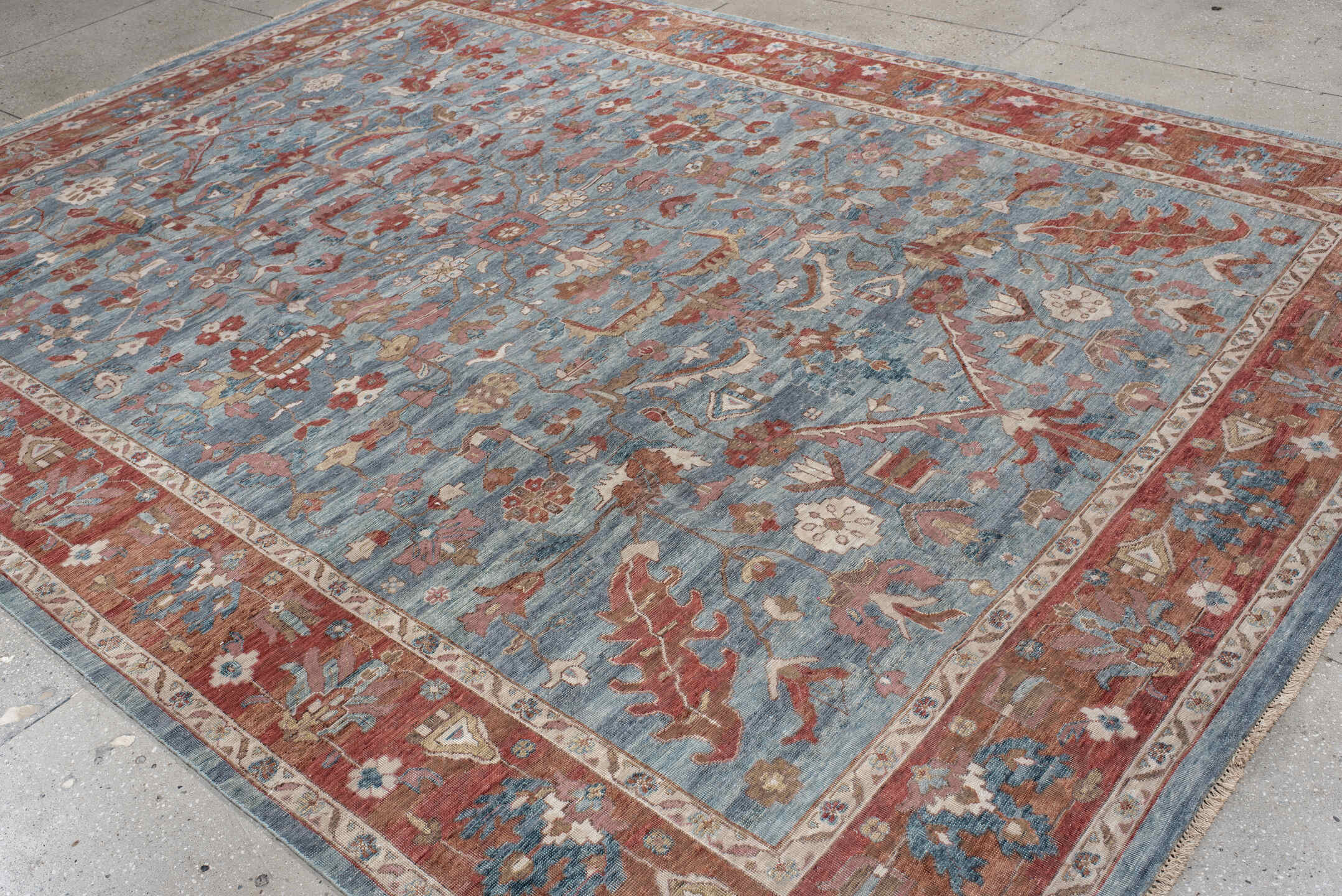 8' x 12' one-of-a-kind handmade vintage Oushak large size rug. Color palette: pale blue, terracotta, ivory, rust, taupe