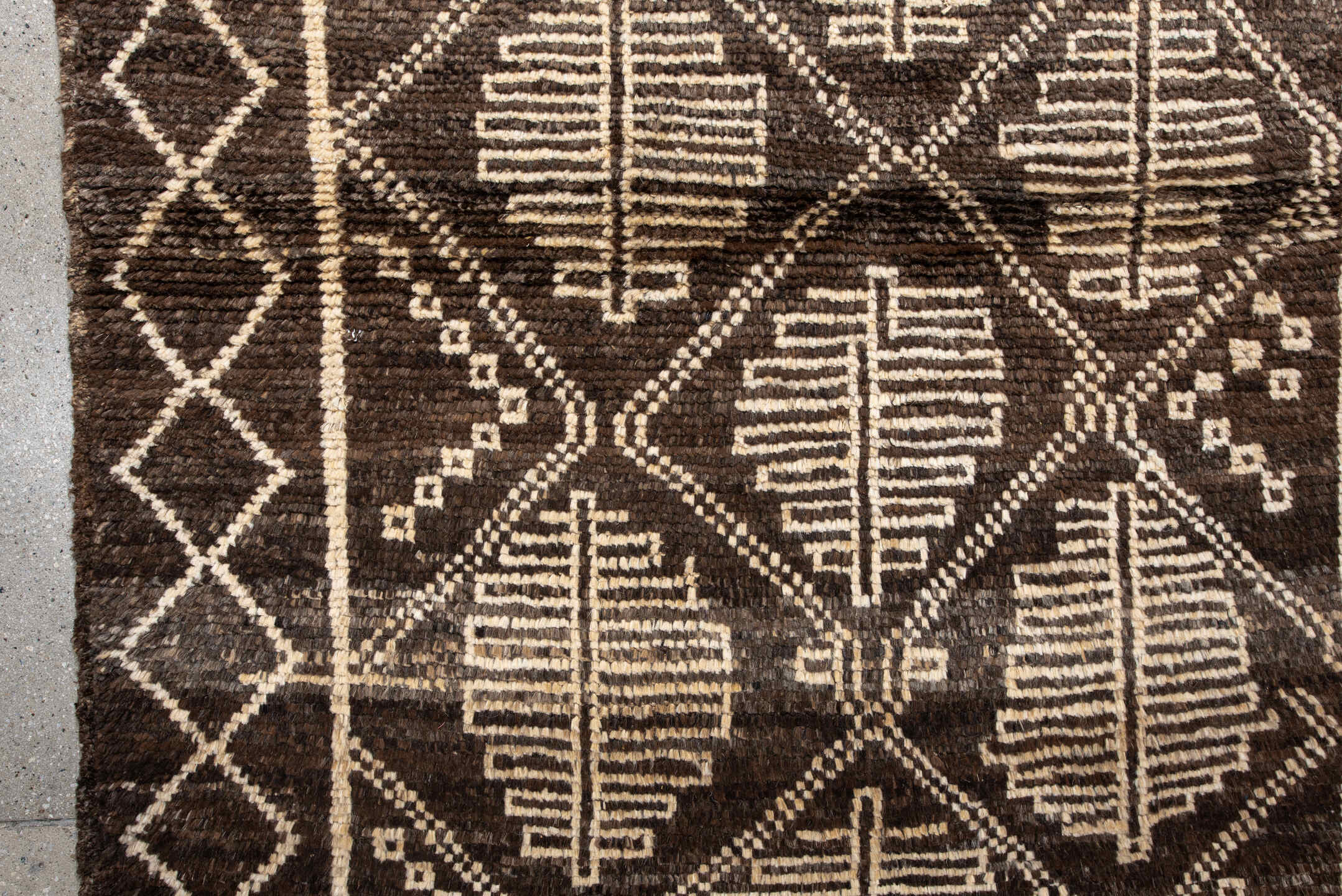 3' x 5' one-of-a-kind handmade vintage Moroccan small size rug. Color palette: brown, ivory, taupe, charcoal, beige, gray