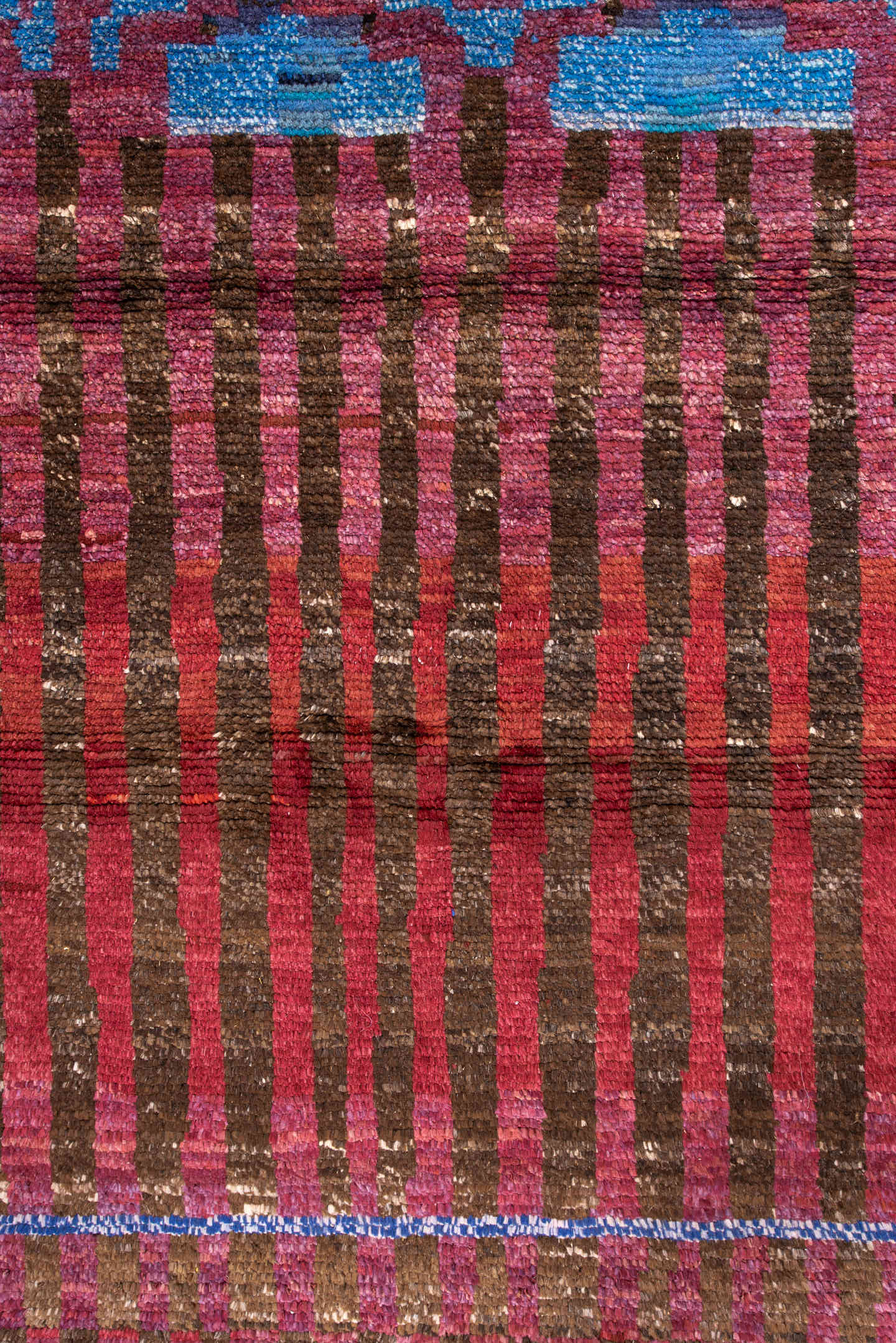 3' x 5' one-of-a-kind handmade vintage Moroccan small size rug. Color palette: brown, crimson, rose, sky blue, burgundy