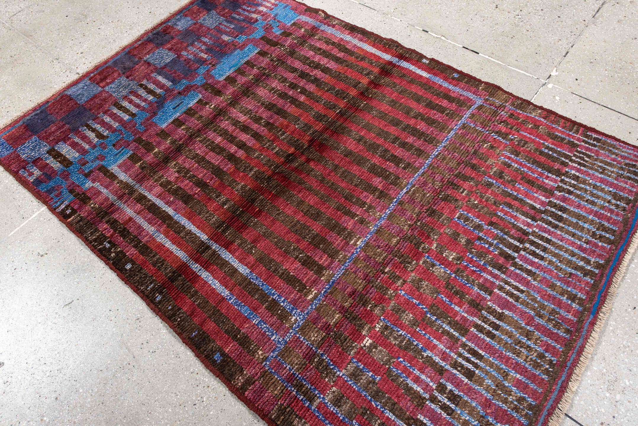 3' x 5' one-of-a-kind handmade vintage Moroccan small size rug. Color palette: brown, crimson, rose, sky blue, burgundy
