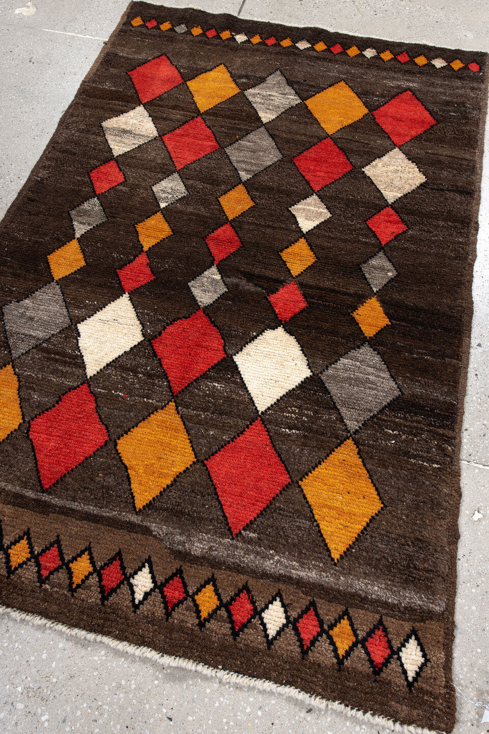 3' x 5' one-of-a-kind handmade vintage Moroccan small size rug. Color palette: brown, rust, saffron, ivory, gray, charcoal