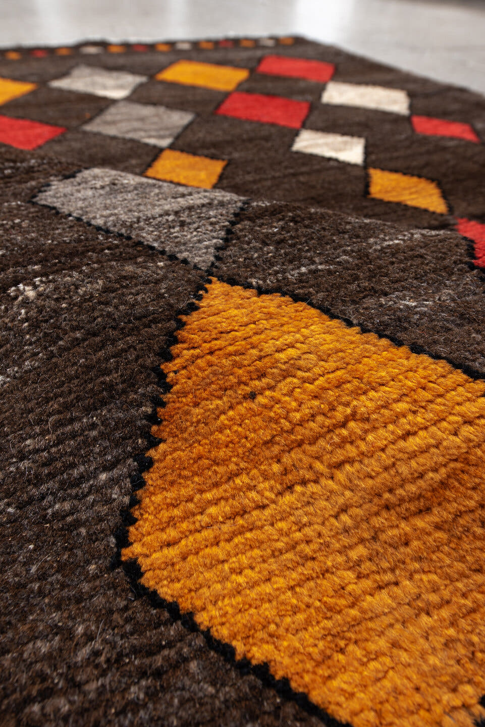 3' x 5' one-of-a-kind handmade vintage Moroccan small size rug. Color palette: brown, rust, saffron, ivory, gray, charcoal
