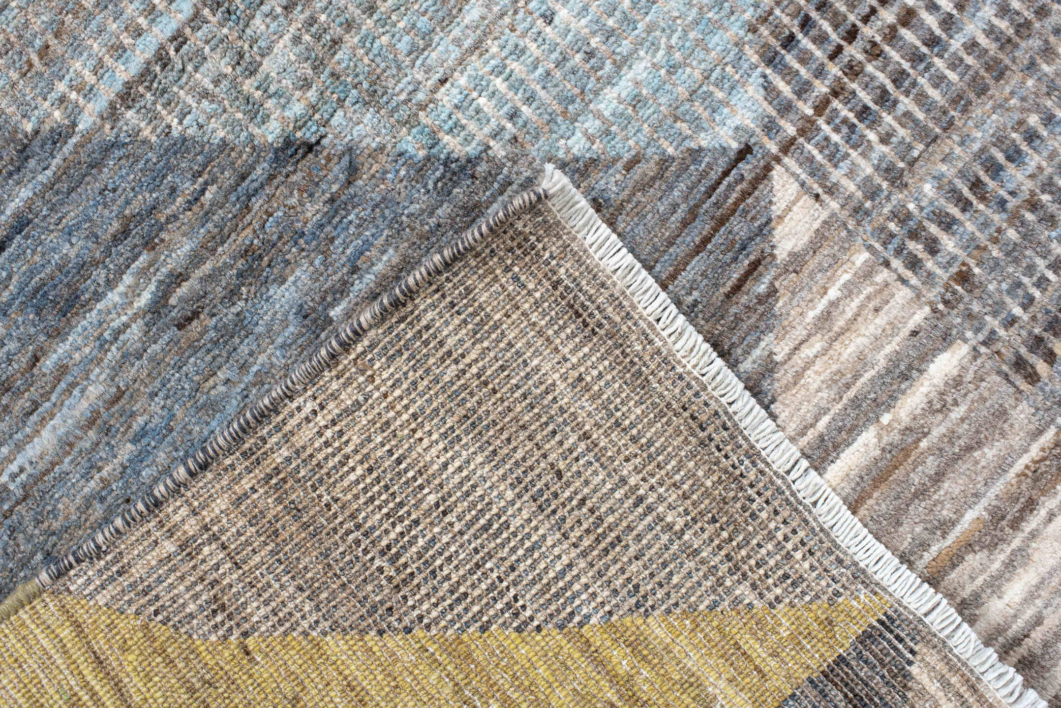 7' x 9' one-of-a-kind handmade handmade Modern rug. Color palette: gray, ivory, gold, light blue, taupe, charcoal, beige