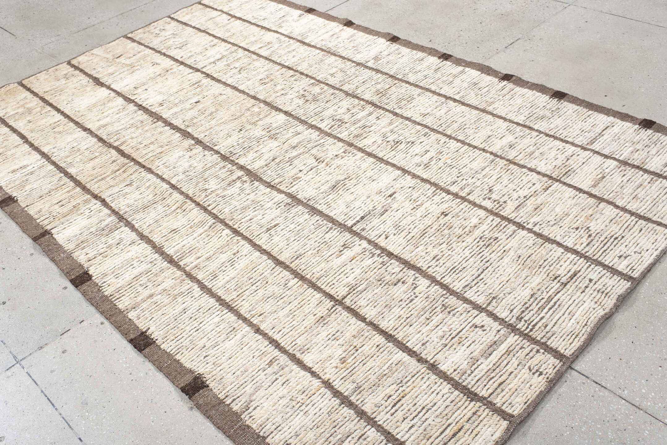 6' x 8' one-of-a-kind handmade vintage Tulu medium size rug. Color palette: ivory, taupe, brown, cream, charcoal, beige