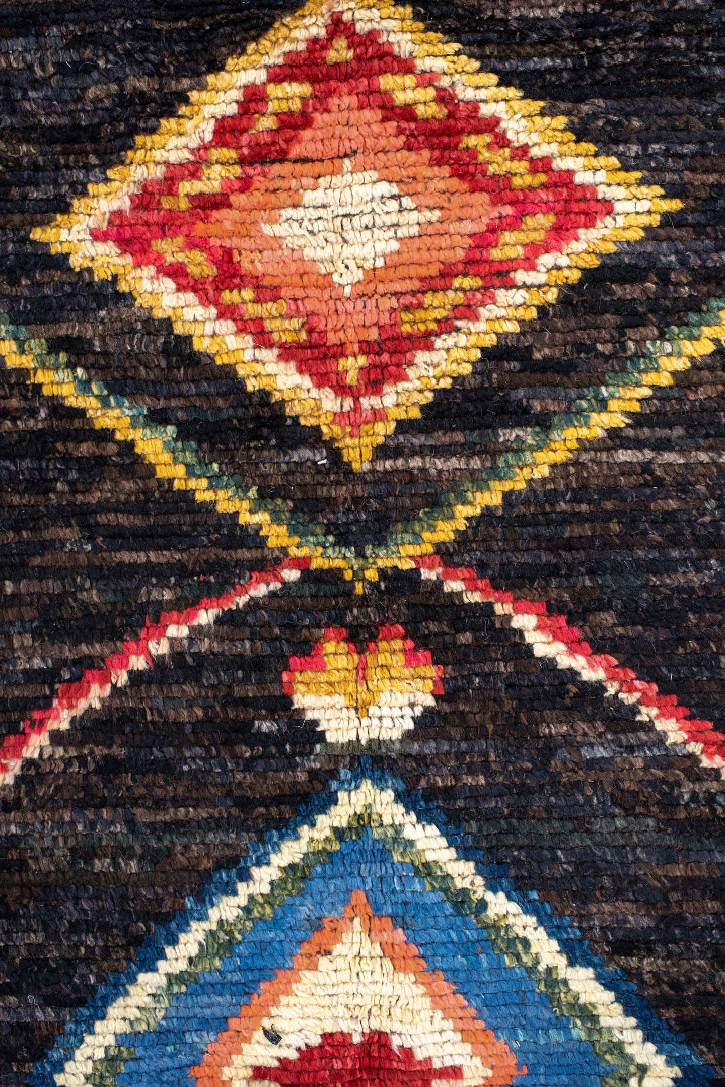 8' x 9' one-of-a-kind handmade vintage Tulu rug. Color palette: charcoal, brown, sky blue, ivory, rust, gold, coral, sage
