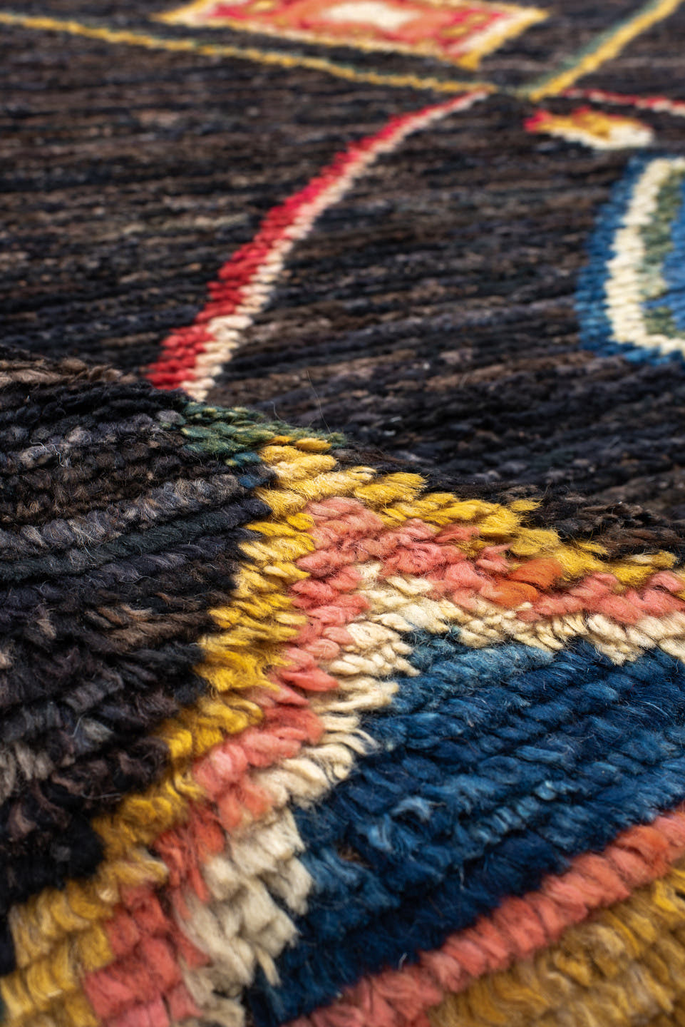 8' x 9' one-of-a-kind handmade vintage Tulu rug. Color palette: charcoal, brown, sky blue, ivory, rust, gold, coral, sage