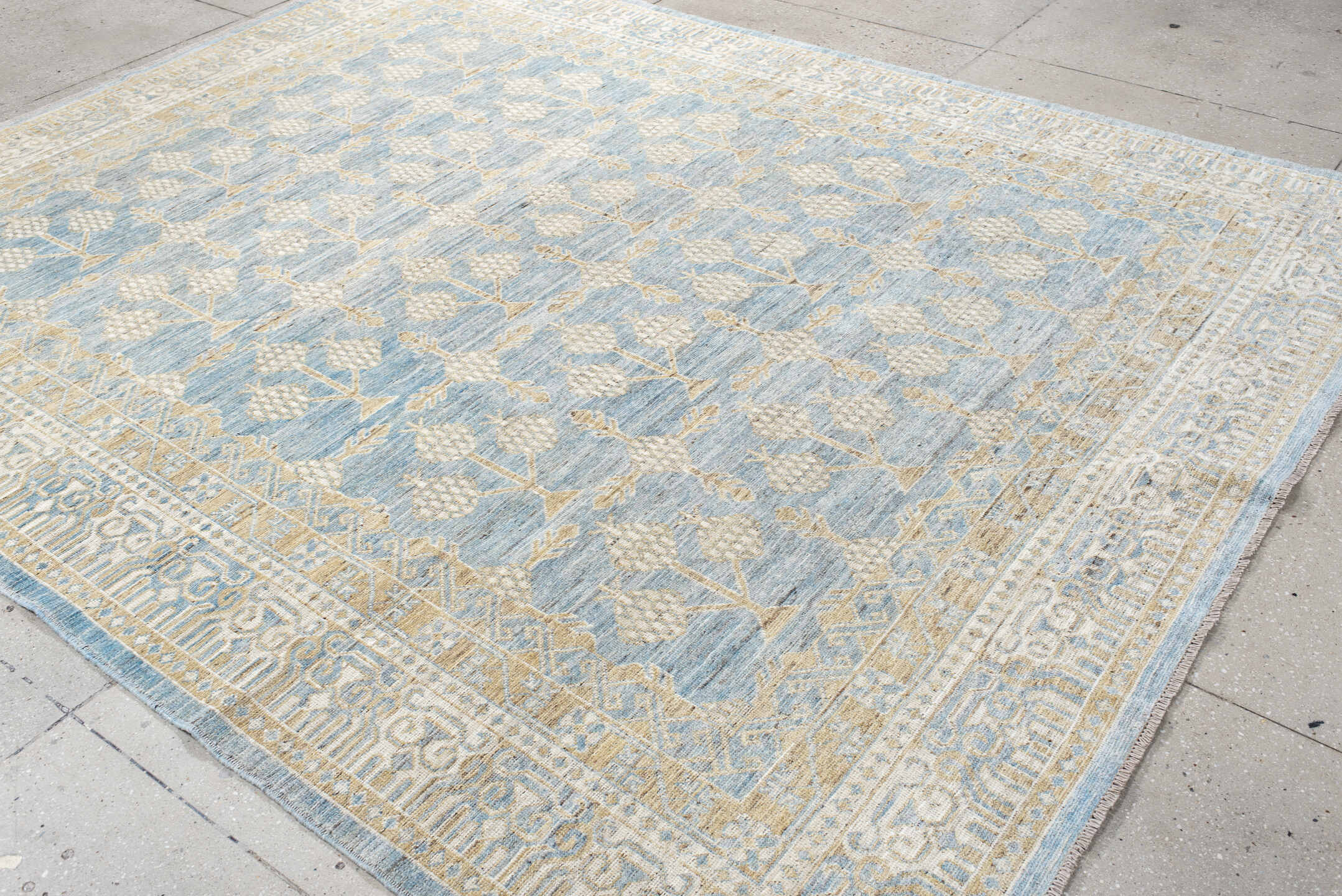 8' x 10' one-of-a-kind handmade vintage Khotan large size rug. Color palette: pale blue, ivory, cream, beige, light gold