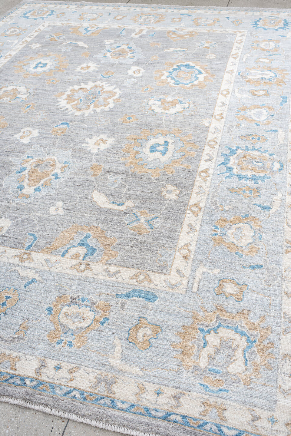 8' x 11' one-of-a-kind handmade vintage Oushak large size rug. Color palette: light gray, ivory, sky blue, beige, taupe