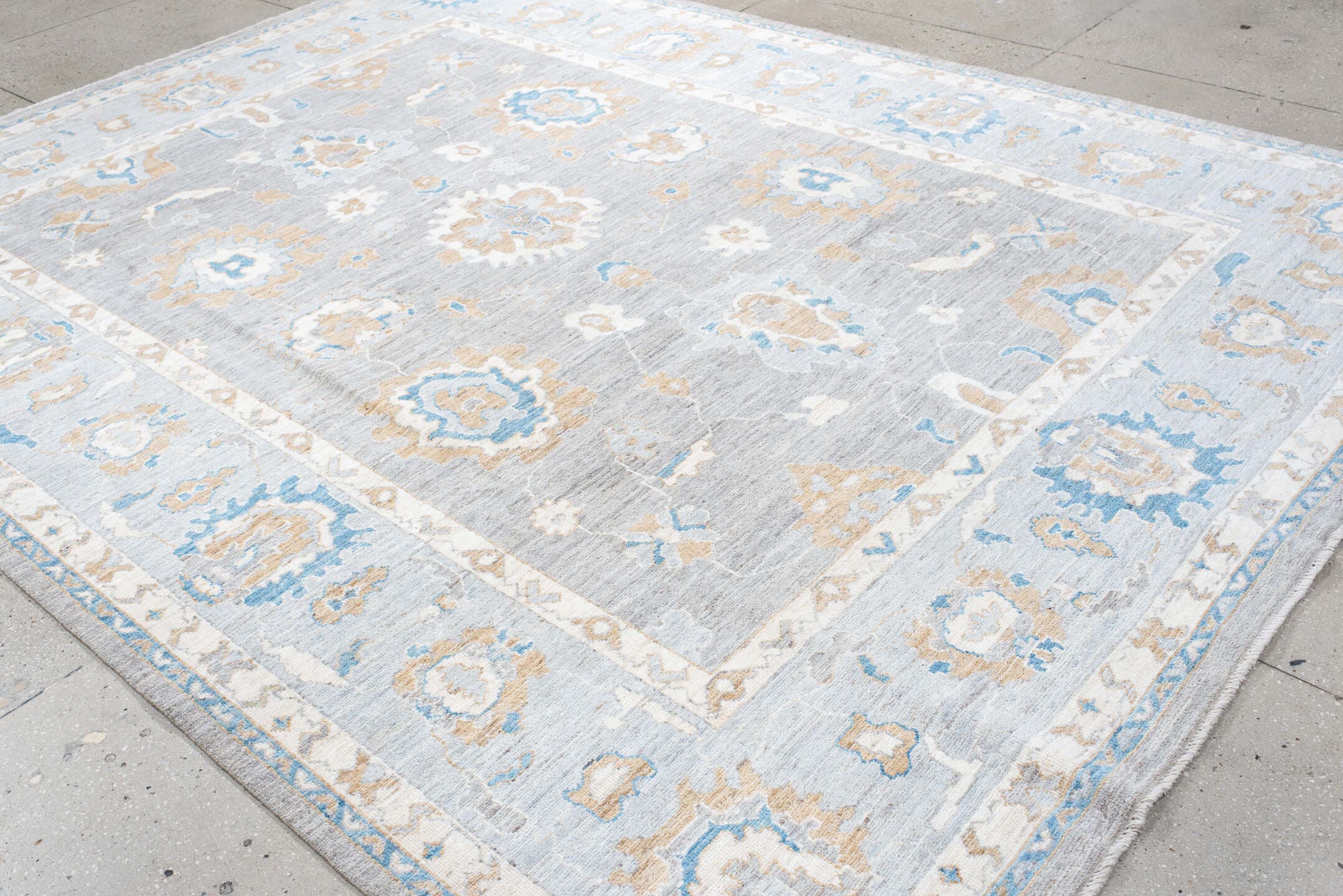 8' x 11' one-of-a-kind handmade vintage Oushak large size rug. Color palette: light gray, ivory, sky blue, beige, taupe