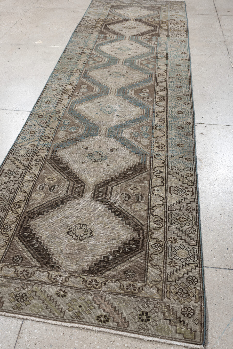 3' x 11' one-of-a-kind handmade antique Malayer runner rug. Color palette: ivory, taupe, sky blue, brown, camel, charcoal