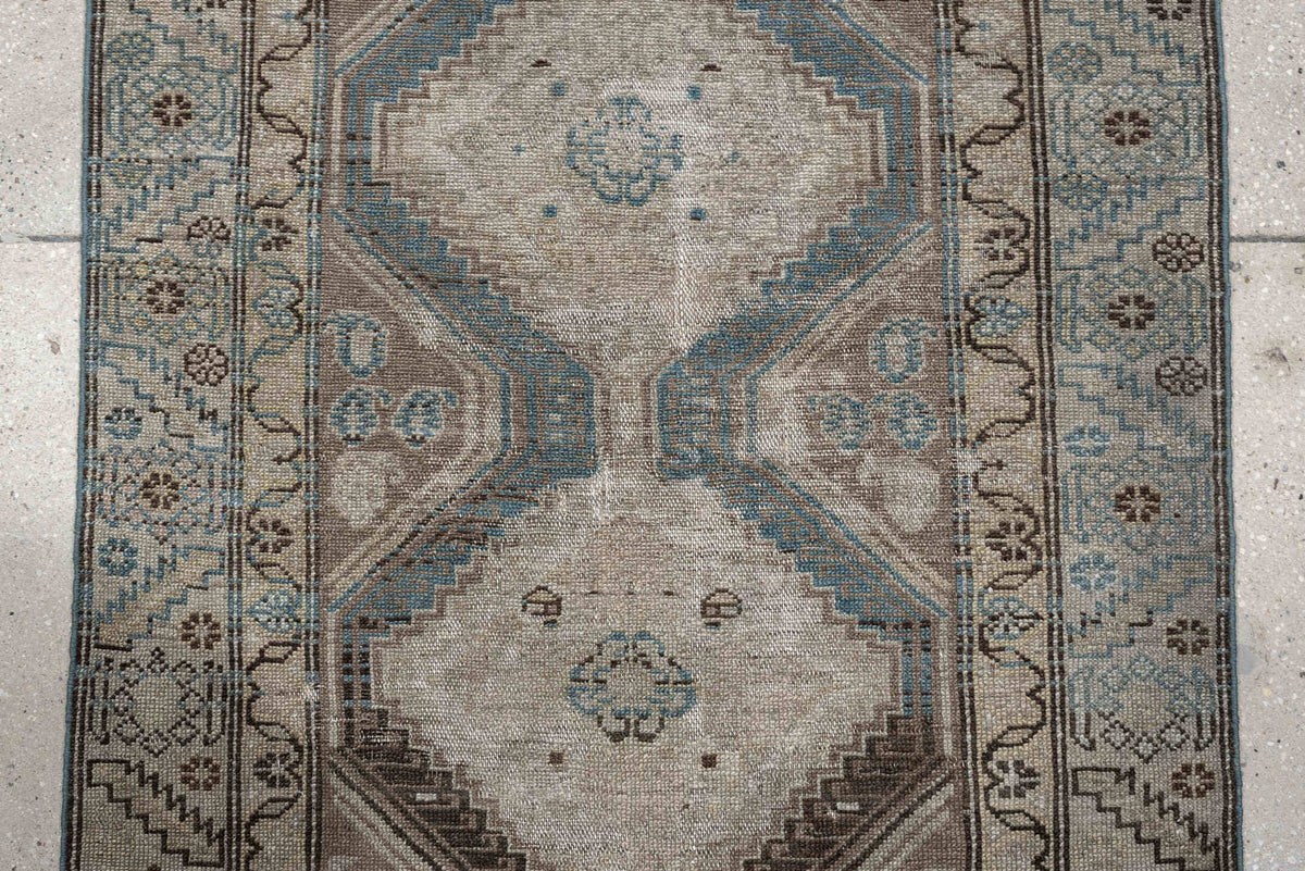 3' x 11' one-of-a-kind handmade antique Malayer runner rug. Color palette: ivory, taupe, sky blue, brown, camel, charcoal