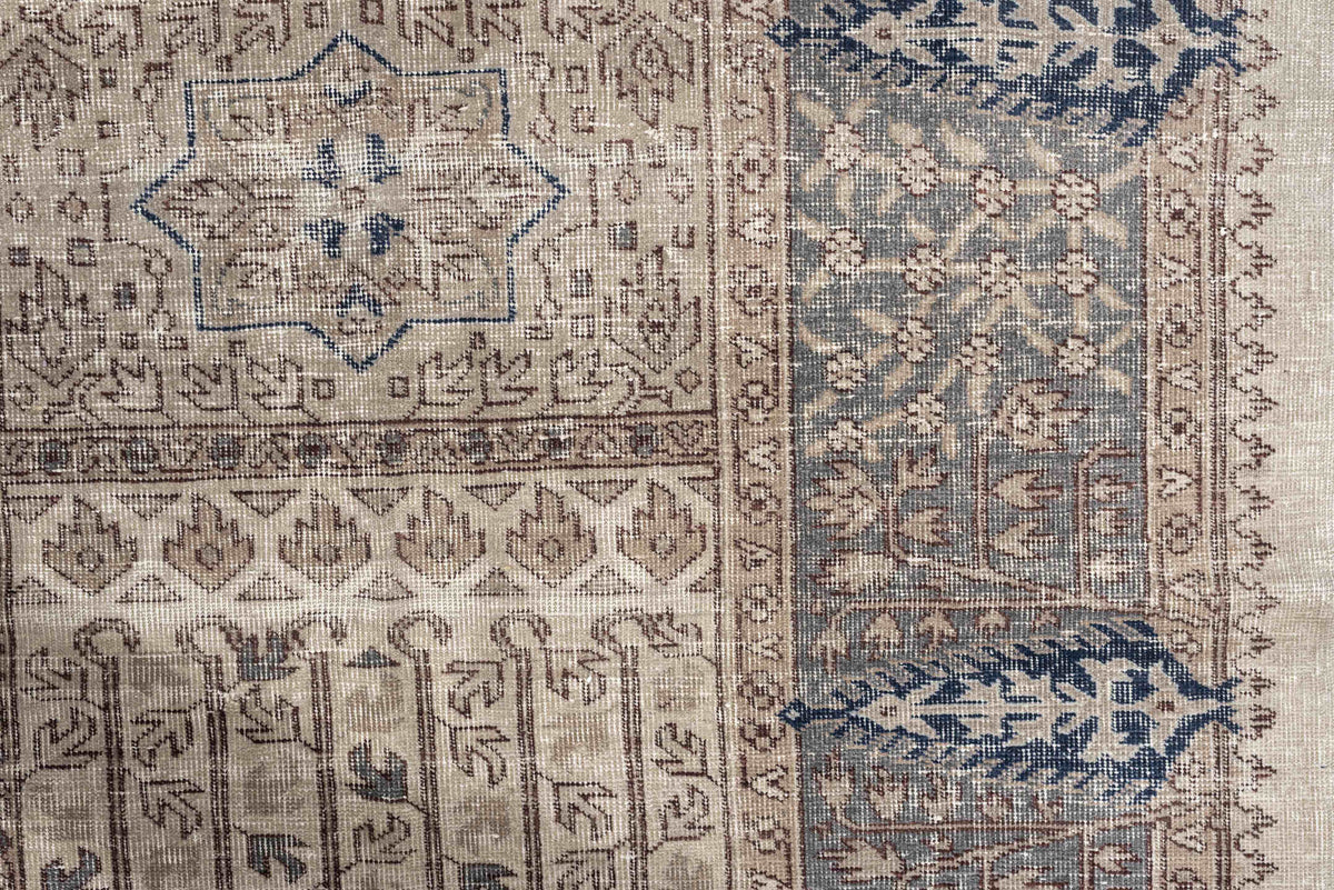9' x 15' one-of-a-kind handmade vintage Sparta rug. Color palette: ivory, taupe, slate blue, charcoal, beige, navy, camel