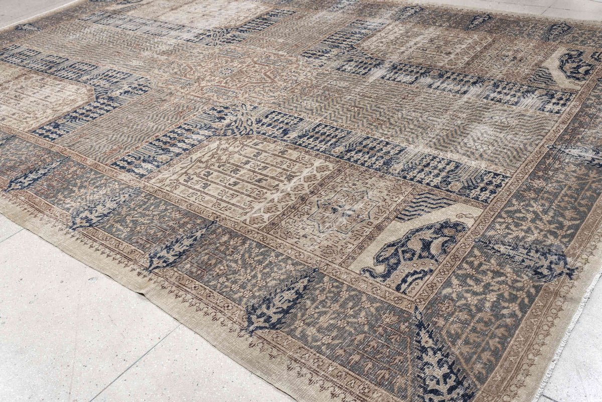 9' x 15' one-of-a-kind handmade vintage Sparta rug. Color palette: ivory, taupe, slate blue, charcoal, beige, navy, camel