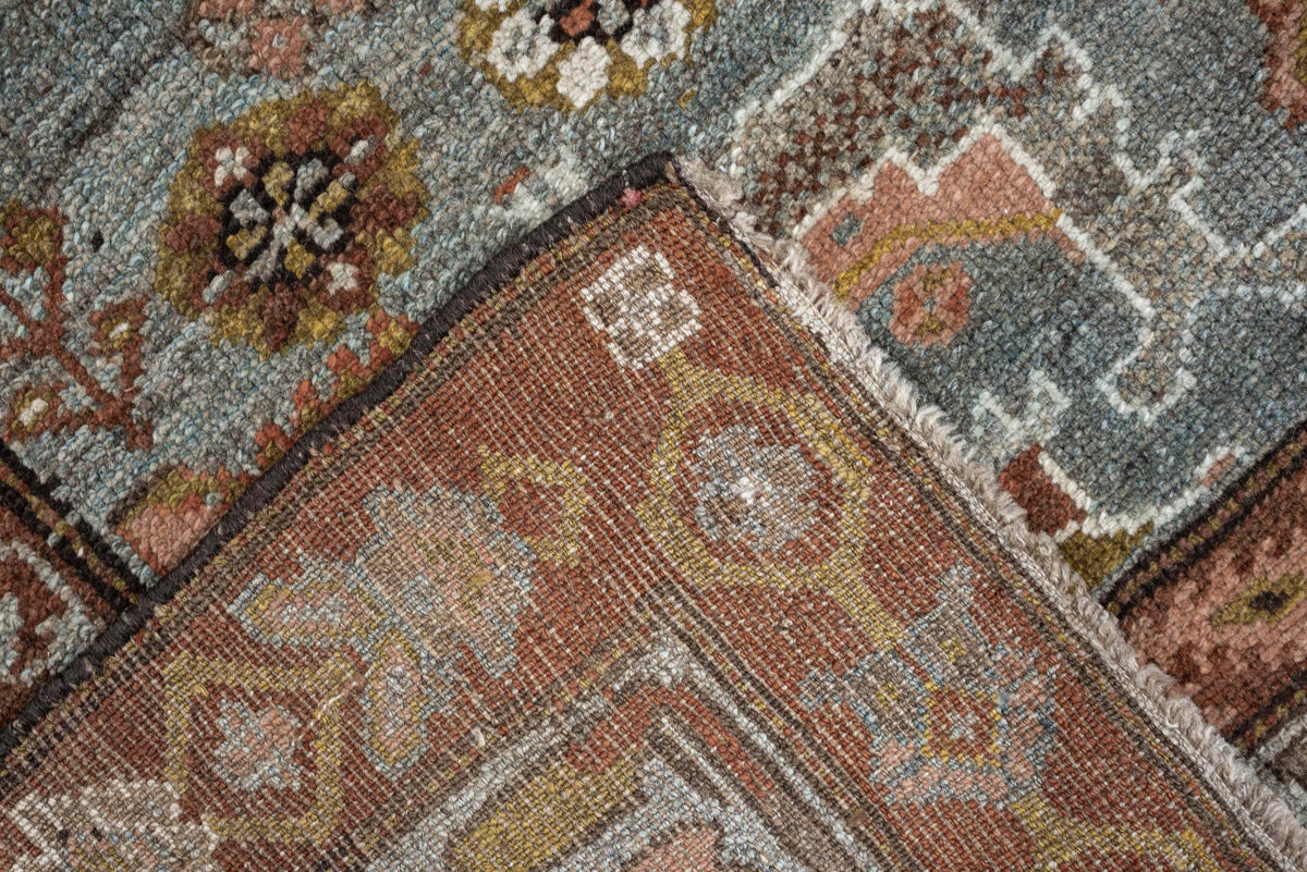 4' x 6' one-of-a-kind handmade antique Baktiary rug. Color palette: blue gray, rust, ivory, rose, taupe, camel, olive, brown