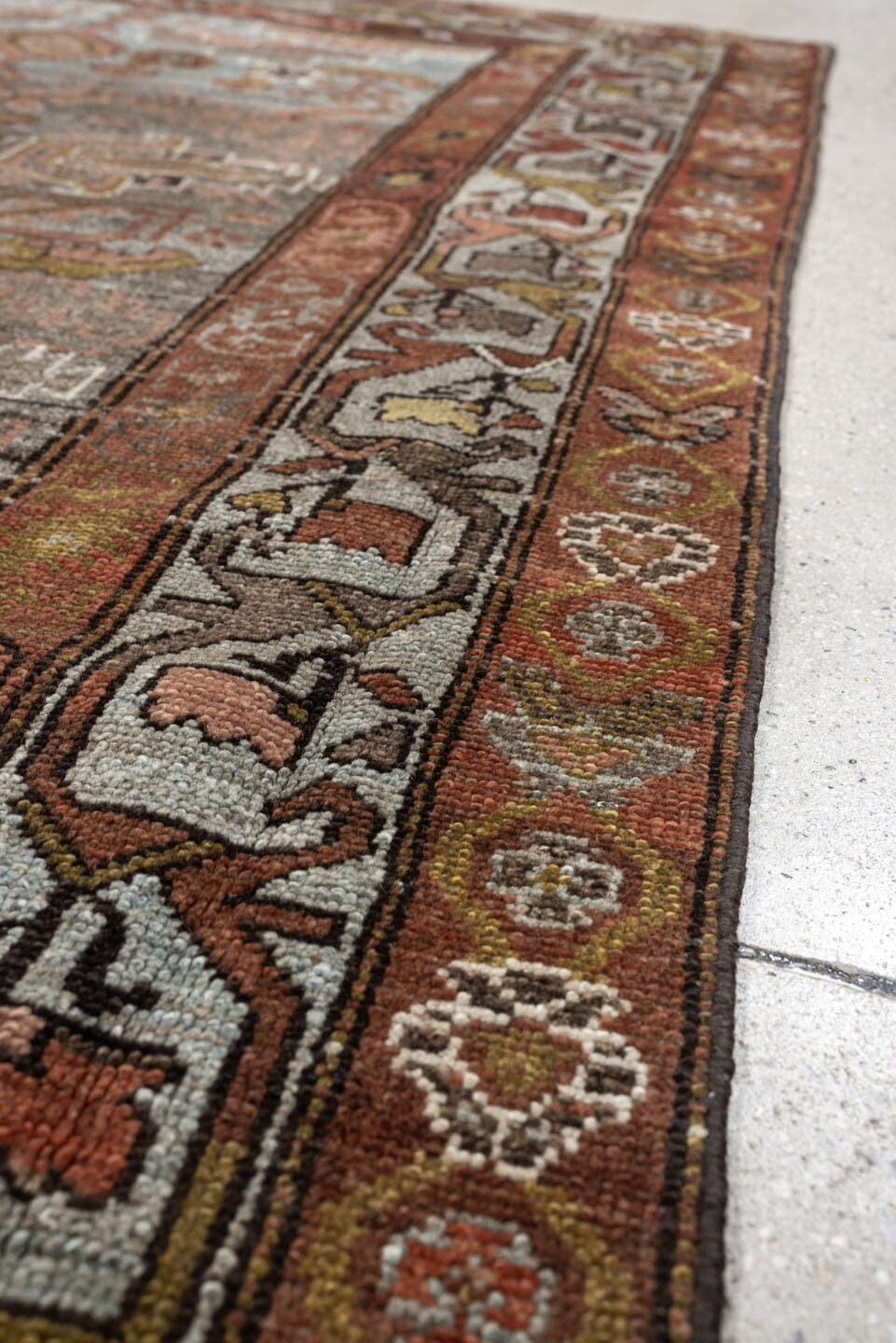 4' x 6' one-of-a-kind handmade antique Baktiary rug. Color palette: blue gray, rust, ivory, rose, taupe, camel, olive, brown