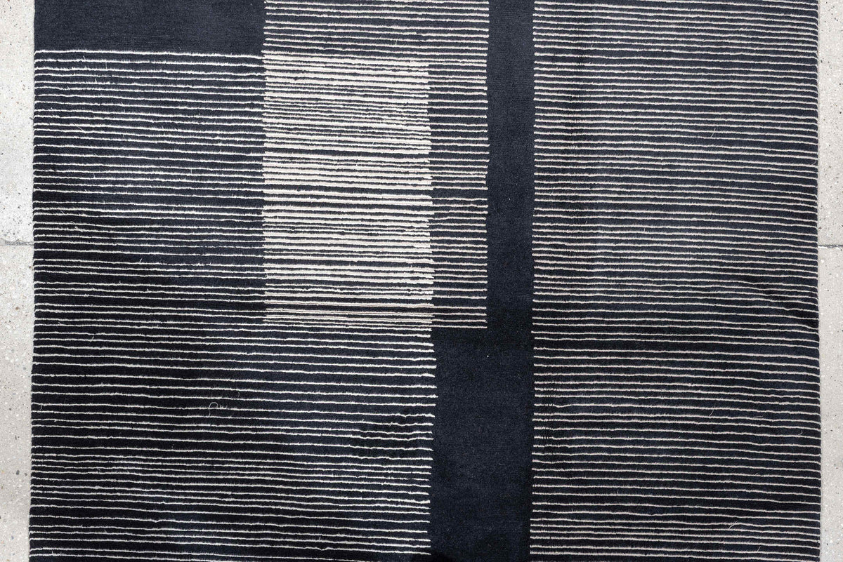 4' x 22' one-of-a-kind handmade antique Tibetan runner rug. Color palette: charcoal, slate, ivory, pewter, ebony, black