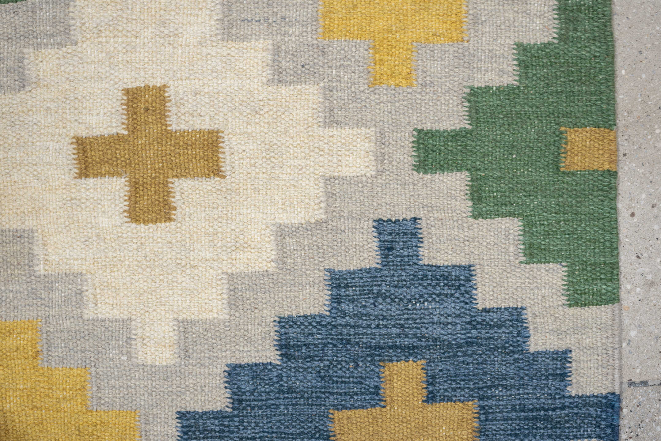 4' x 6' one-of-a-kind handmade antique Rollaken rug. Color palette: ivory, denim blue, yellow, sage green, dusty rose