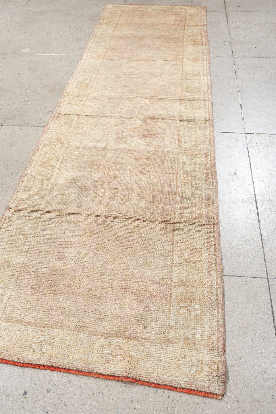 3' x 11' one-of-a-kind handmade antique Oushak runner rug. Color palette: ivory, blush, beige, soft sage, peach, pink