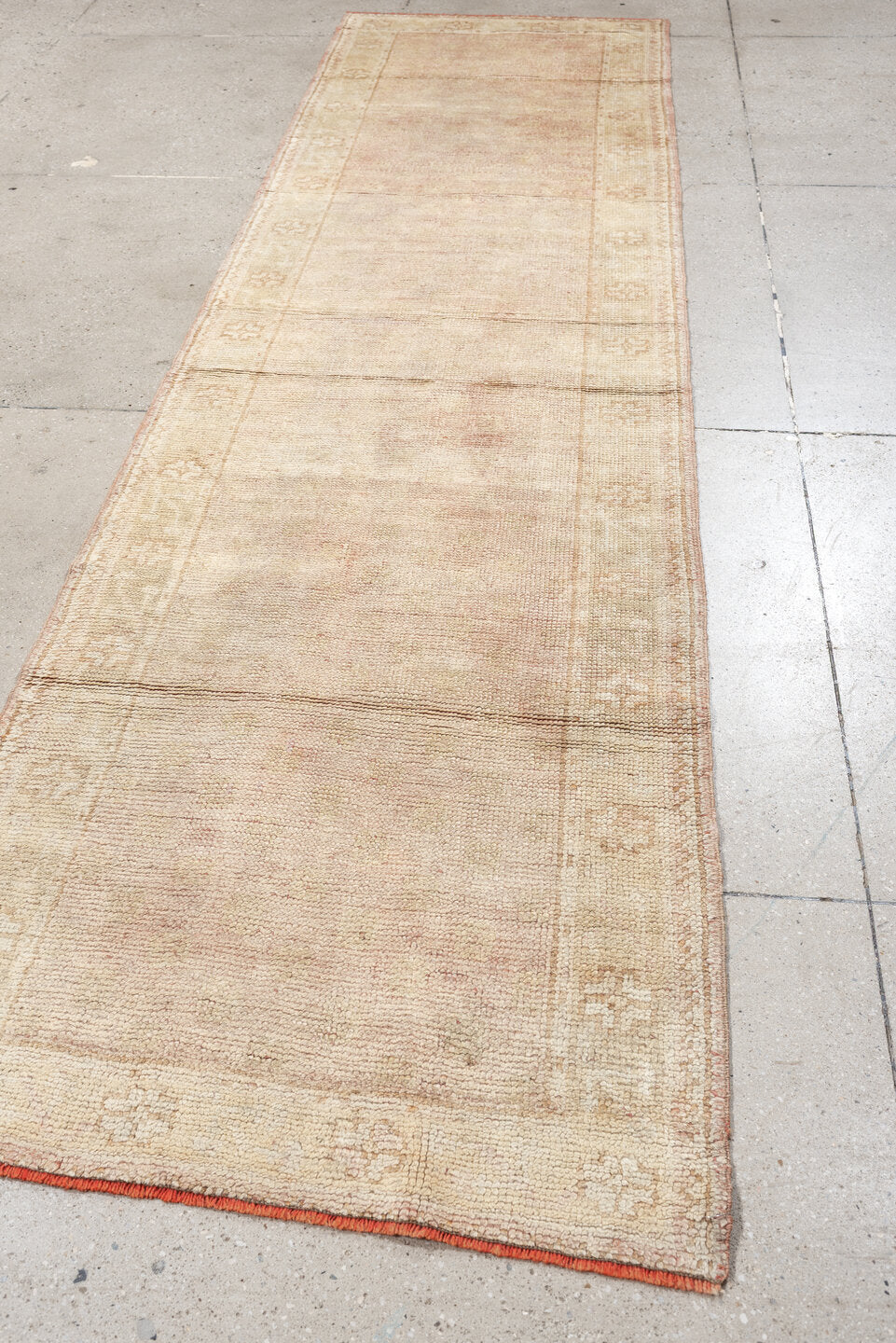 3' x 11' one-of-a-kind handmade antique Oushak runner rug. Color palette: ivory, blush, beige, soft sage, peach, pink