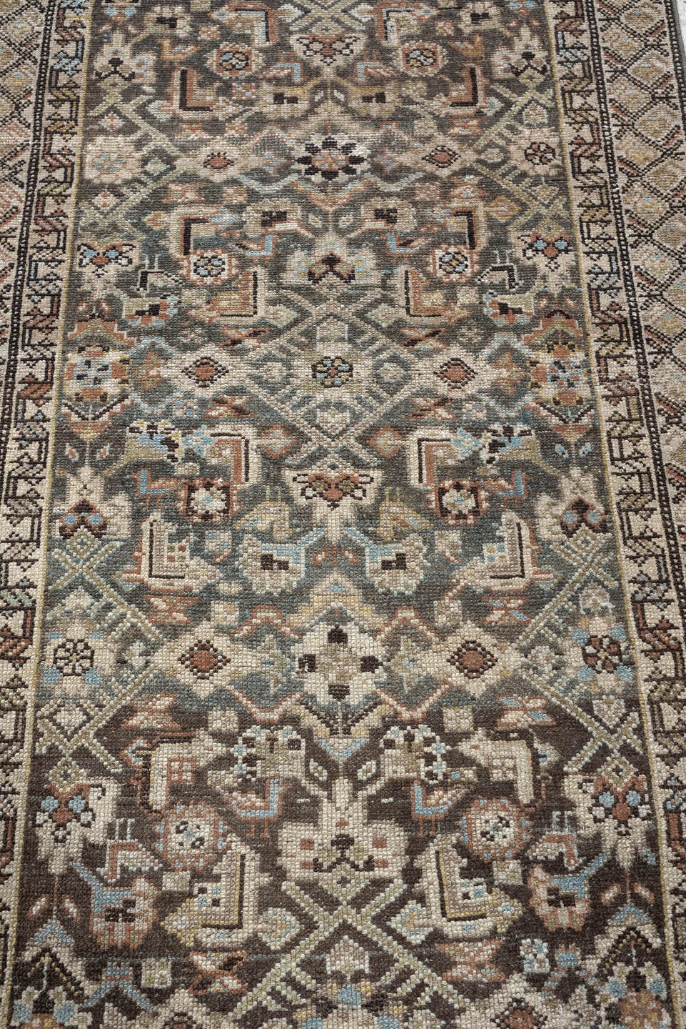 2' x 18' one-of-a-kind handmade antique runner rug. Color palette: blue gray, ivory, camel, charcoal, rust, taupe, sage