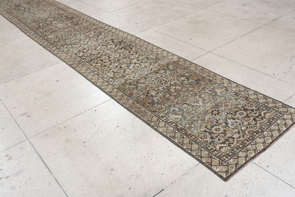 2' x 18' one-of-a-kind handmade antique runner rug. Color palette: blue gray, ivory, camel, charcoal, rust, taupe, sage