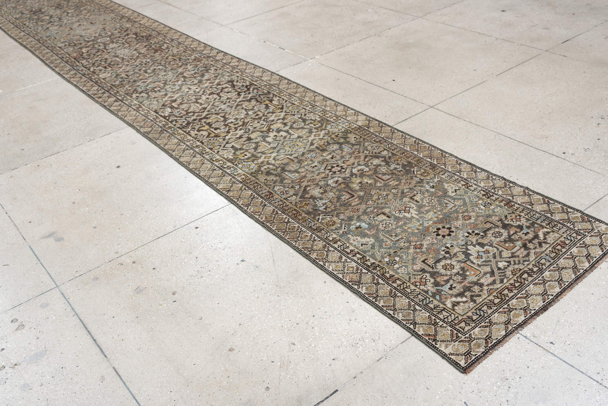 2' x 18' one-of-a-kind handmade antique runner rug. Color palette: blue gray, ivory, camel, charcoal, rust, taupe, sage