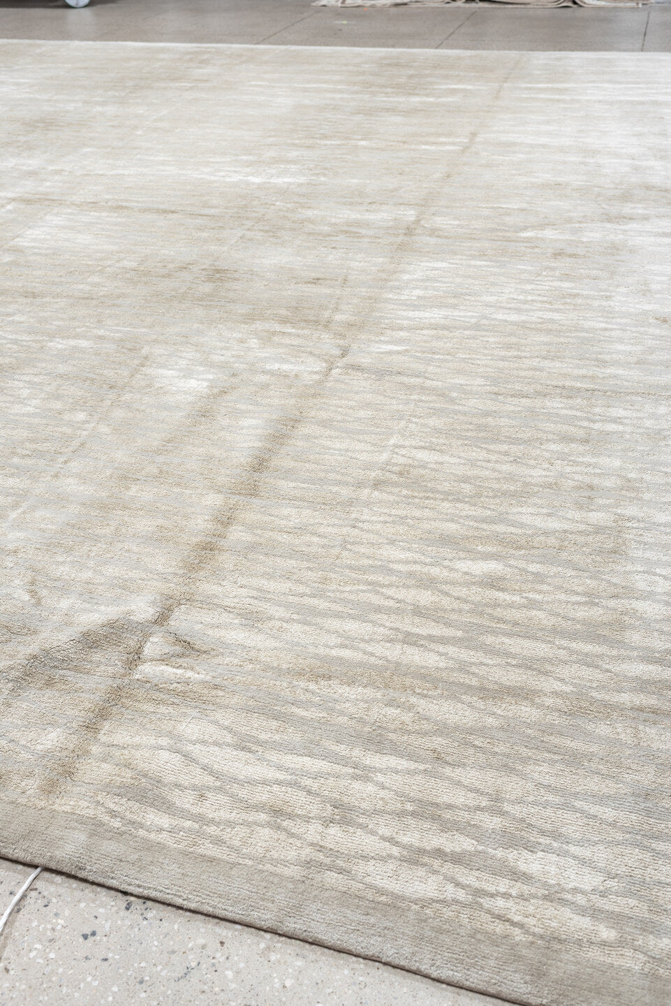 14' x 15' one-of-a-kind handmade antique Tibetan oversize rug. Color palette: ivory, pale gray, taupe, beige, light gray