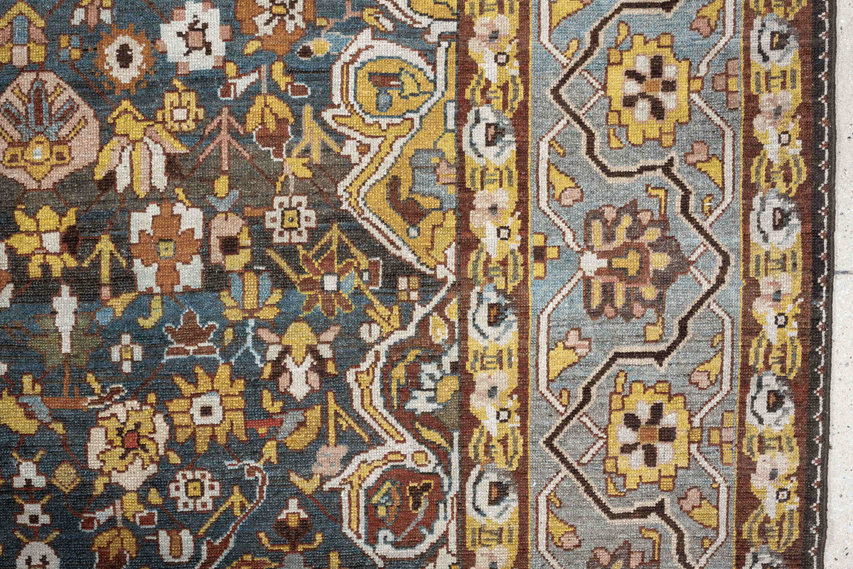 13' x 19' one-of-a-kind handmade antique Baktiary oversize rug. Color palette: charcoal, teal, rust, pale blue, ivory, gold