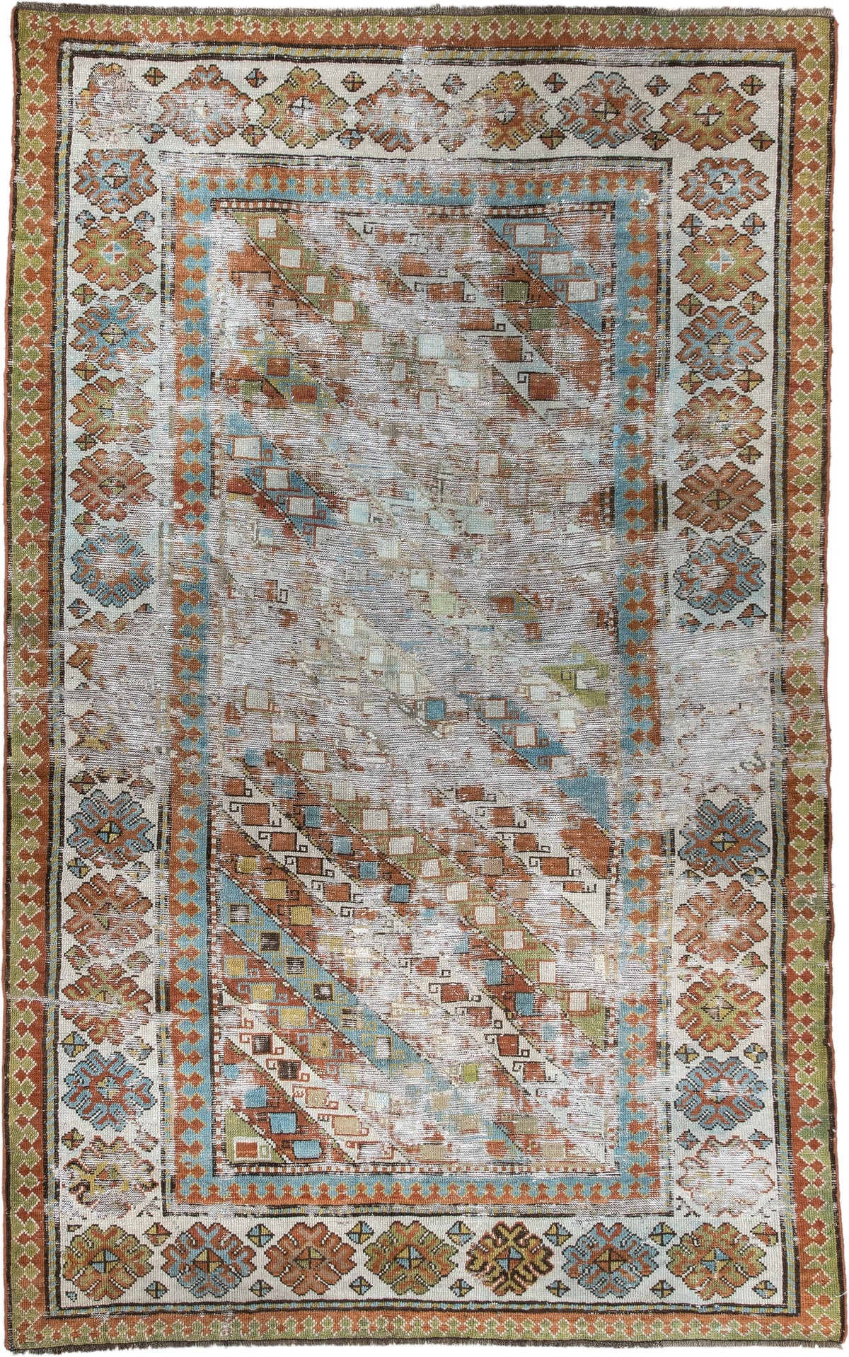 4' x 6' one-of-a-kind handmade antique Caucasian rug. Color palette: ivory, rust, sky blue, olive, camel, taupe, brown
