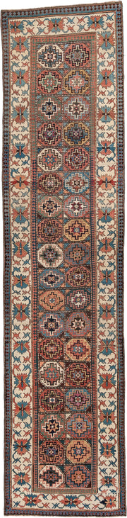 3' x 13' one-of-a-kind handmade antique Caucasian runner rug. Color palette: indigo, ivory, rust, coral, teal, charcoal