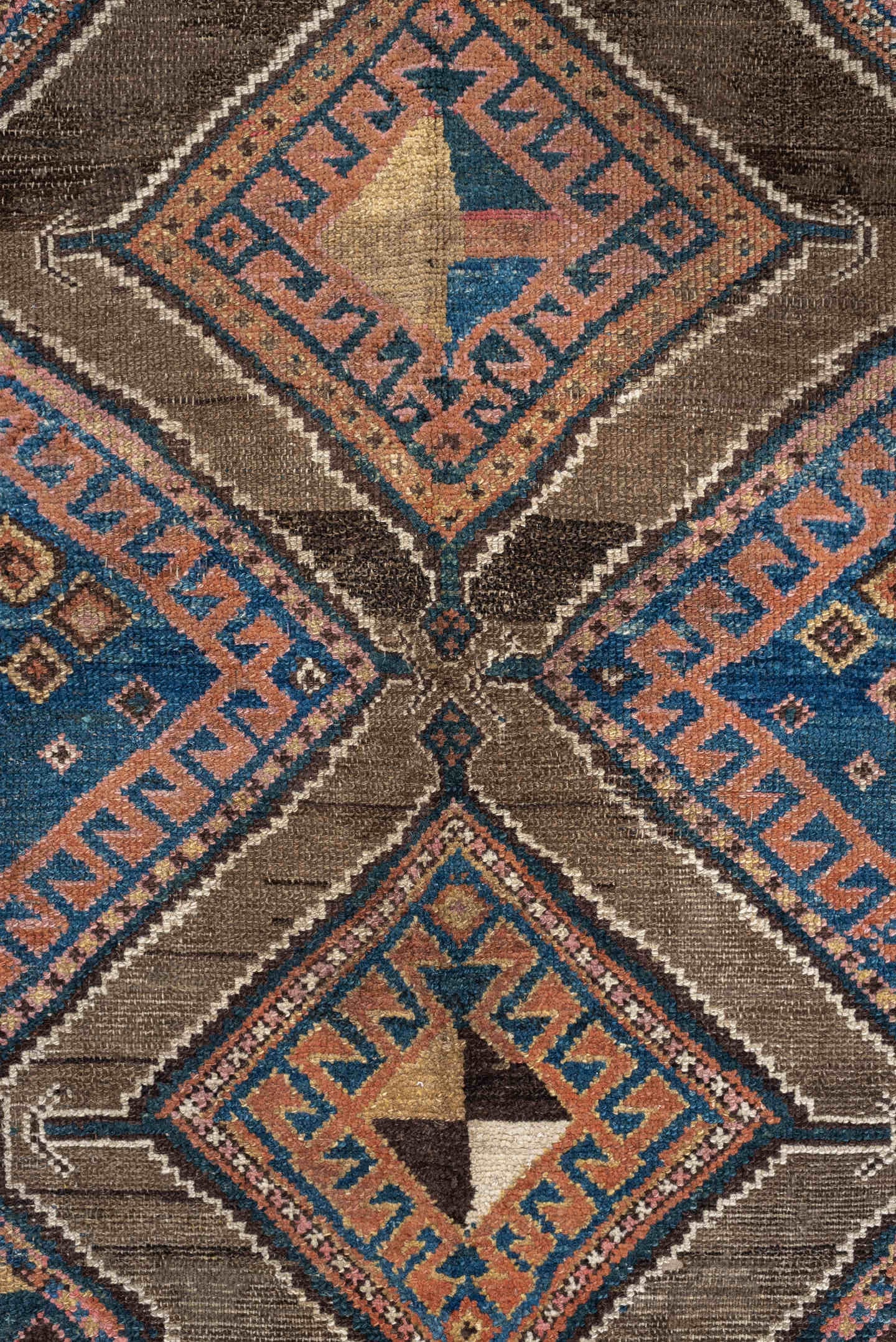 3' x 6' one-of-a-kind handmade antique Kurd runner rug. Color palette: teal blue, camel, rose, ivory, brown, navy, salmon