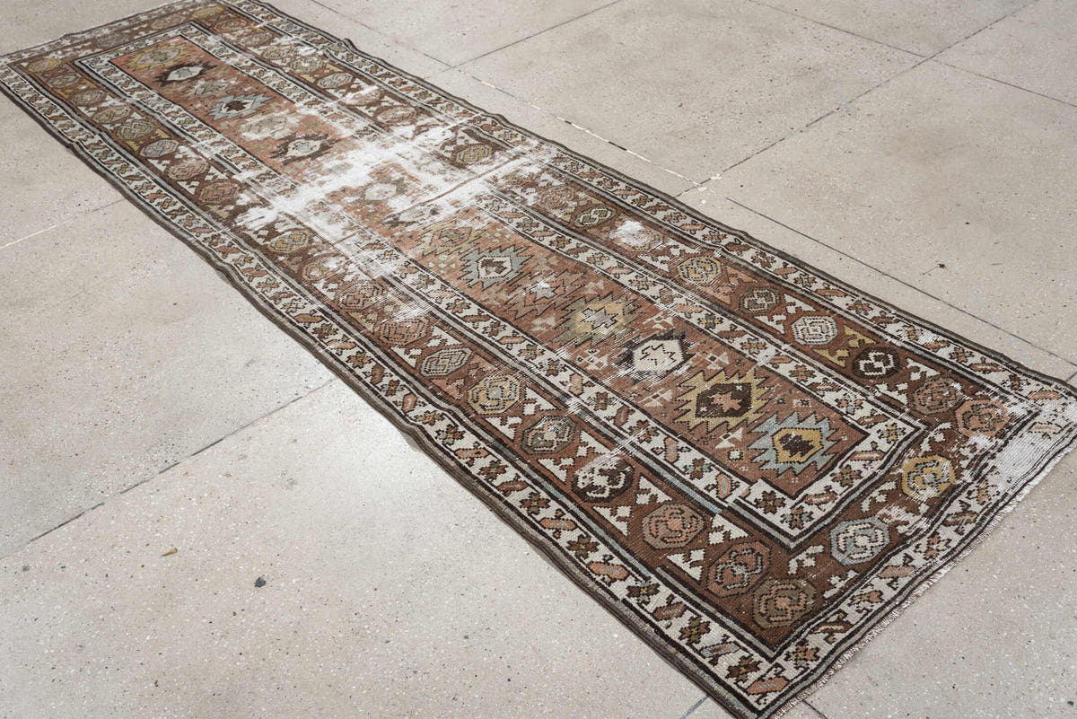 3' x 10' one-of-a-kind handmade antique NW Persian runner rug. Color palette: terra cotta, ivory, brown, olive, camel, taupe