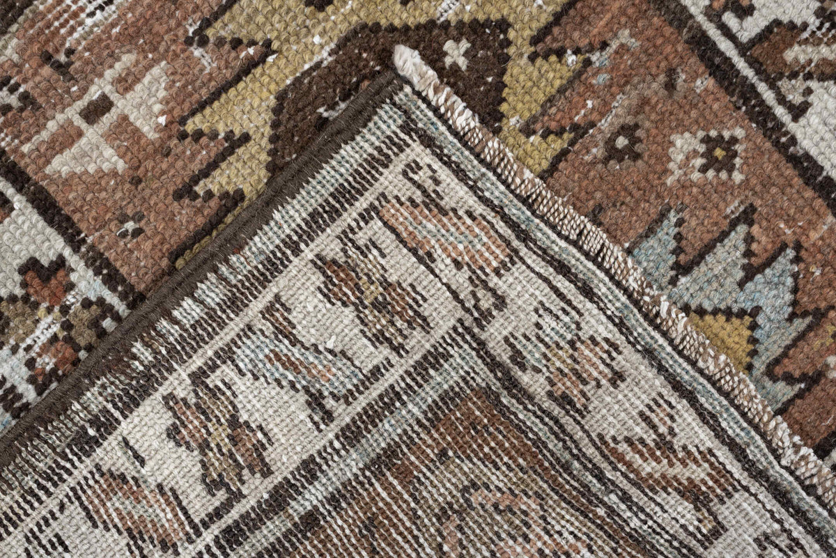 3' x 10' one-of-a-kind handmade antique NW Persian runner rug. Color palette: terra cotta, ivory, brown, olive, camel, taupe