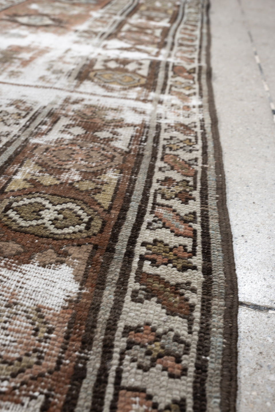 3' x 10' one-of-a-kind handmade antique NW Persian runner rug. Color palette: terra cotta, ivory, brown, olive, camel, taupe