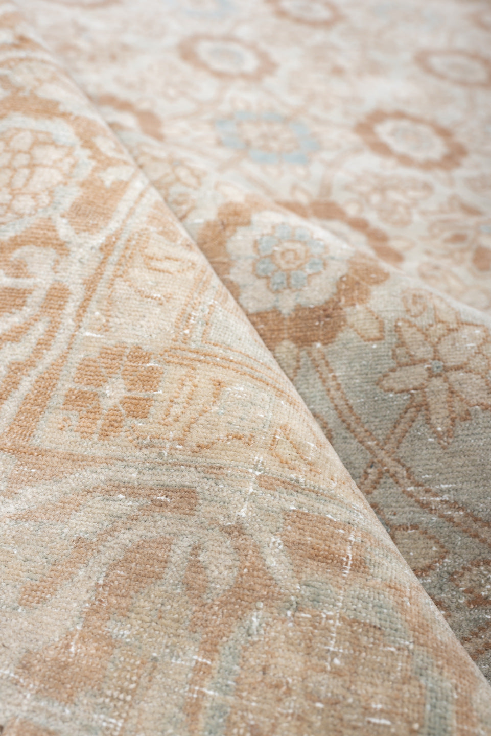 5' x 7' one-of-a-kind handmade antique Tabriz rug. Color palette: ivory, blush, pale blue, peach, beige, taupe, pink