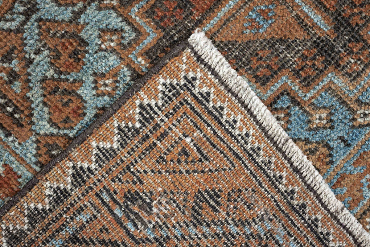 2' x 4' one-of-a-kind handmade antique Belouch small size rug. Color palette: rust, pale blue, camel, dark brown, ivory