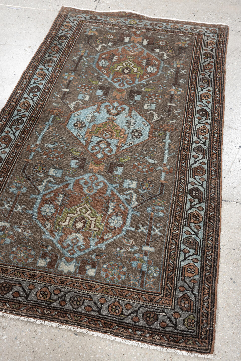 2' x 4' one-of-a-kind handmade vintage Malayer small size rug. Color palette: brown, sky blue, rust, ivory, taupe, olive