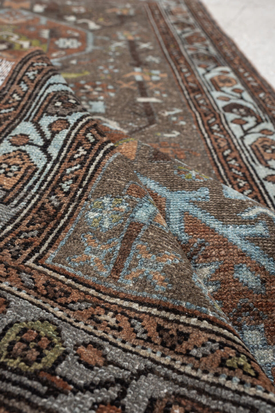 2' x 4' one-of-a-kind handmade vintage Malayer small size rug. Color palette: brown, sky blue, rust, ivory, taupe, olive
