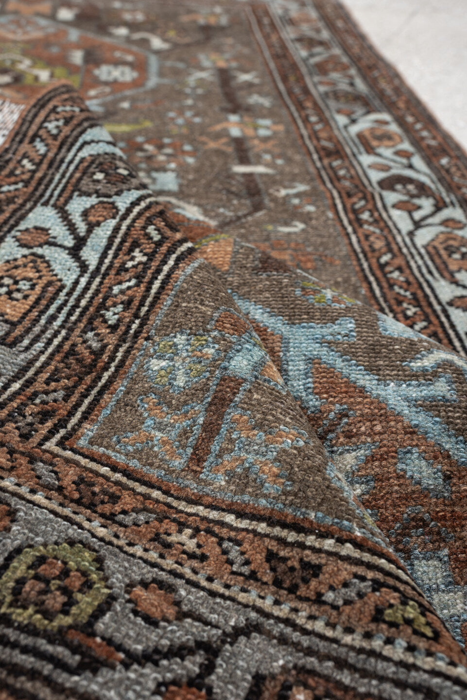 2' x 4' one-of-a-kind handmade vintage Malayer small size rug. Color palette: brown, sky blue, rust, ivory, taupe, olive