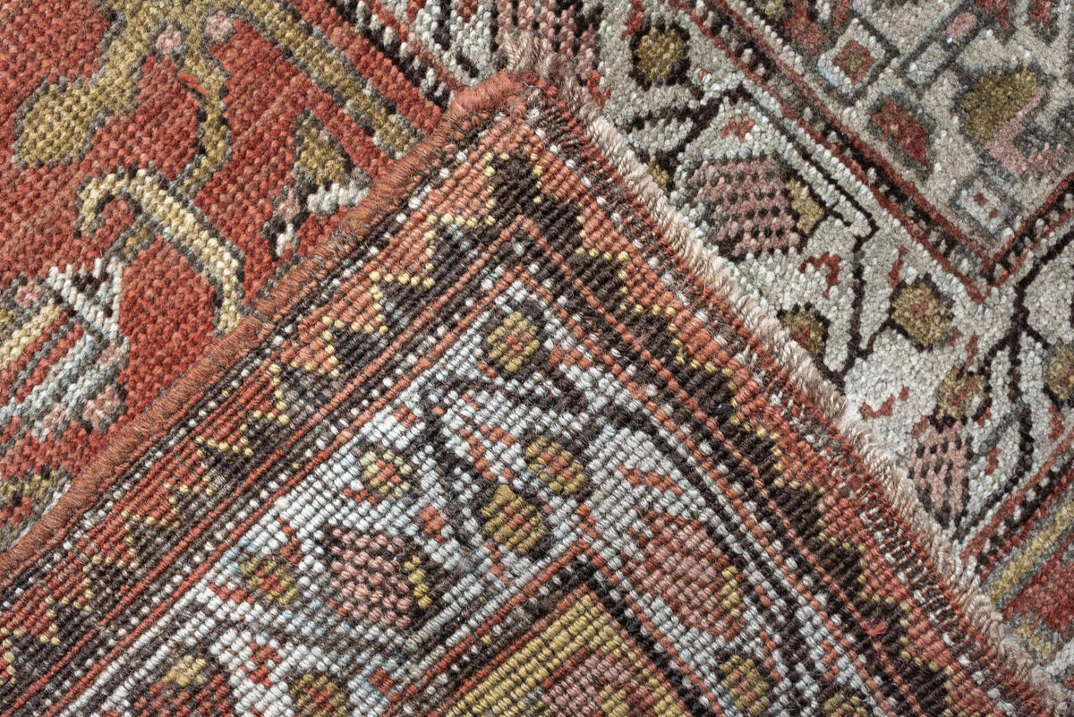 12' x 22' one-of-a-kind handmade antique Bidjar oversize rug. Color palette: terracotta, blue gray, ivory, rust, coral