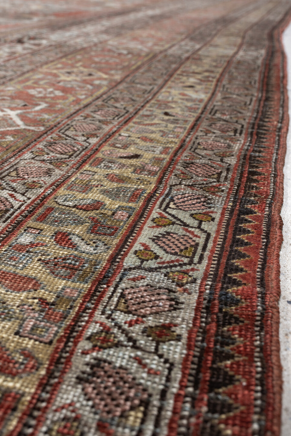 12' x 22' one-of-a-kind handmade antique Bidjar oversize rug. Color palette: terracotta, blue gray, ivory, rust, coral